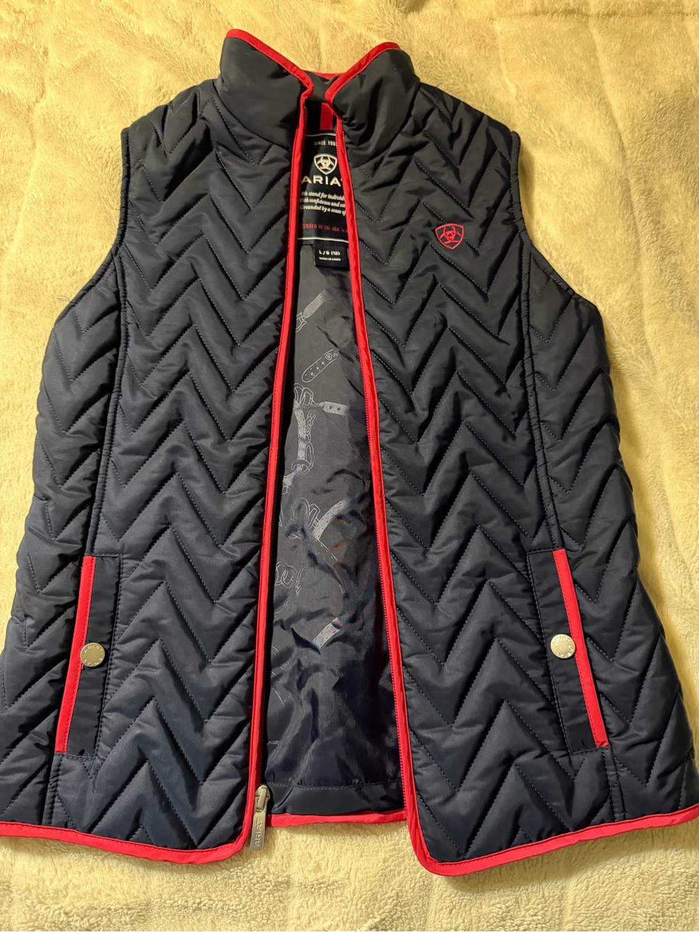 Ariat Quilted Navy Vest with pink Trim